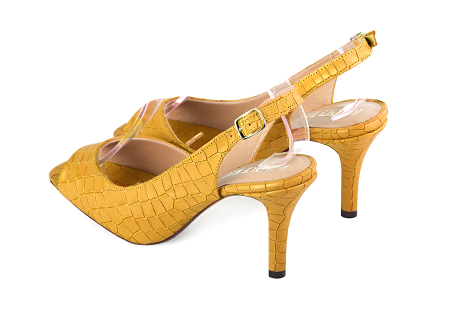 Dress heels peep-toe slingback in mustard yellow leather with high slim heels and round toe - Rear view